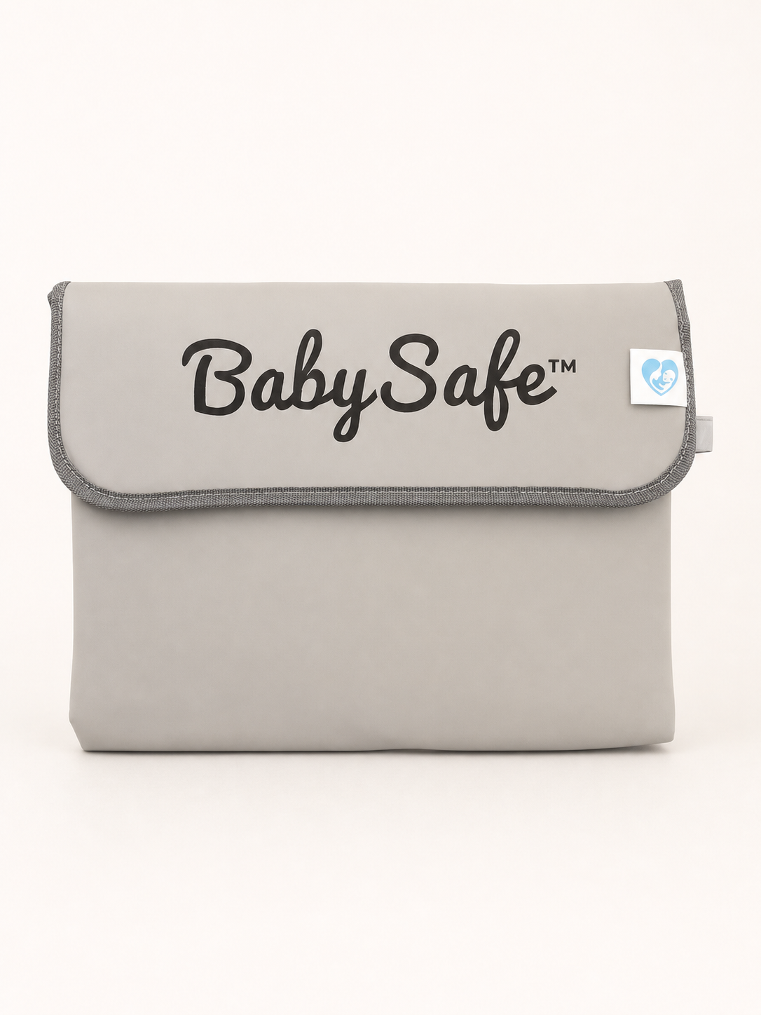 Folded grey BabySafe portable changing pad with the official logo