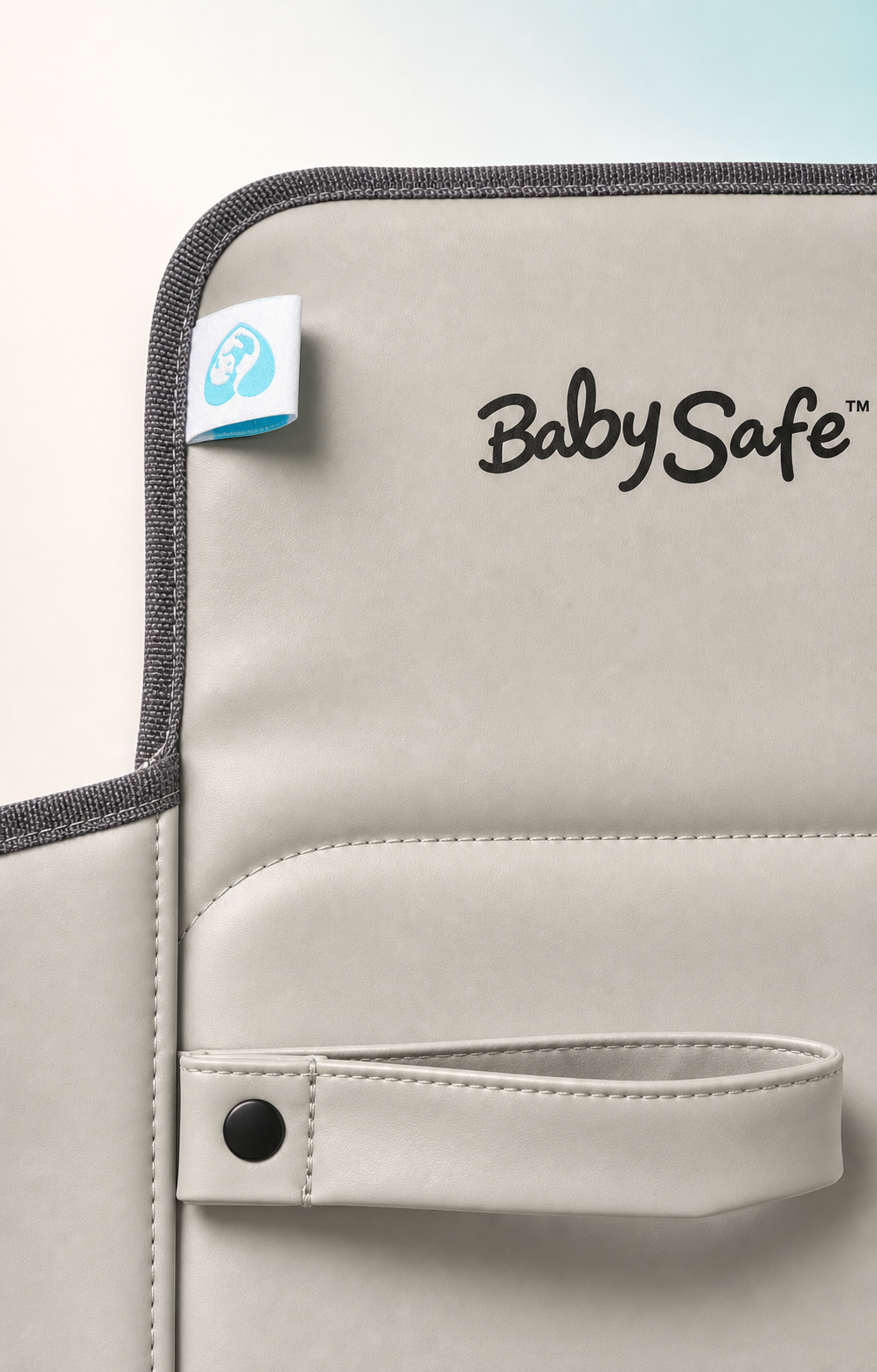Close-up of BabySafe stitching, strap, trim, logo and label
